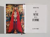 a book with a picture of a woman in a red dress