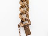 a gold chain with a padlock attached to it