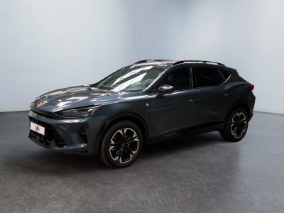 a grey toyota c - hr suv parked in a large room