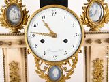 a clock that is sitting on top of a table