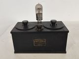 a close up of a black box with two light bulbs on top of it