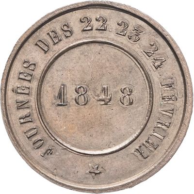 une vieille pièce d'argent portant la date de naissance du président