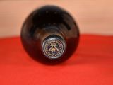 a bottle of wine that is sitting on a table