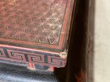 a close up of a table with a book on top of it