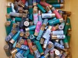 a yellow box filled with lots of different colored cans