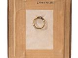 a picture of a picture of a ring in a box