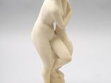 an image of a statue of a woman with her hands on her head