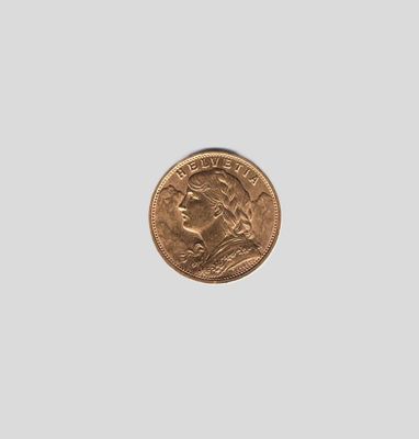 gros plan d'une pièce de monnaie sur une surface blanche
