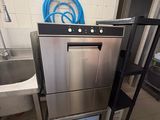 a stainless steel dishwasher in a small kitchen