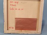 a picture of a picture in a box with writing on it