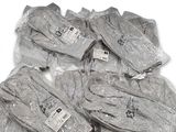 a pile of gloves that have been wrapped in plastic
