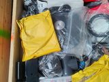 a box full of assorted items sitting on the floor