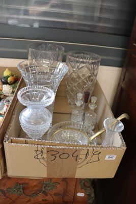 a box with a lot of glass items in it