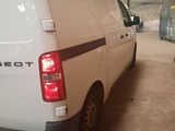 a white van that is parked in a garage
