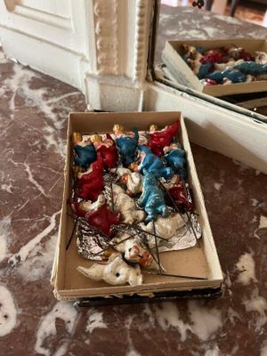a box of christmas ornaments sitting on a table