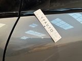 a sticker on the door of a car that says october