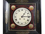 an image of a black and white clock with pictures on it