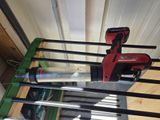 a picture of a tool rack with tools on it