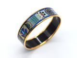 a close up of a ring on a white surface