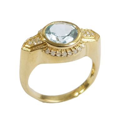 BAGUE en argent doré 925/1000 ornée d'une topaze d'environ 2…