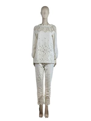 an image of a mannequin dressed in white clothing