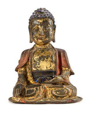 an image of a statue of a person sitting in a lotus pose
