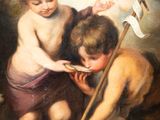 a painting of two young boys eating a piece of bread
