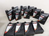 several bottles of motor oil are lined up in a circle