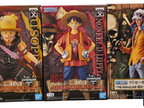 three action figures of one piece and one piece of the same character