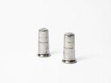 pair of silver salt and pepper shakers on a white surface