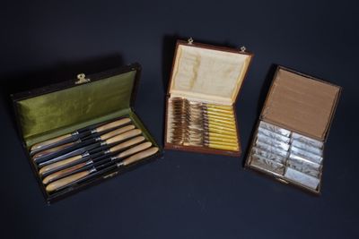 three different types of pens in a case on a table