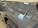 a close up of a car with a sticker on the back of it