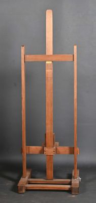 an old wooden easel with a piece of wood sticking out of it