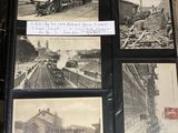 a black and white photo of a train on the tracks