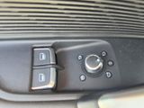 a close up of a control panel in a car