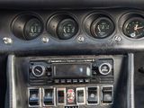 a car dashboard with various gauges and gauges on it