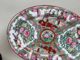 a plate with a design on it sitting on a table