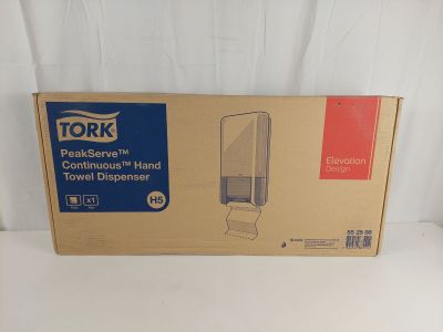 packaging of a boxed toilet paper dispenser on a white surface