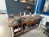 an image of a workbench in a warehouse