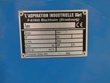a sign on the side of a blue machine