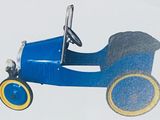 a blue toy car that is sitting on a white surface