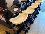 a lot of chairs that are lined up in a row