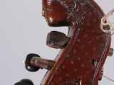 a close up of a musical instrument on a stand