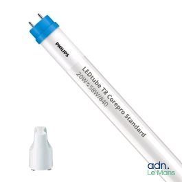 un gros plan d'un stylo muni d'une pointe bleue