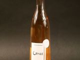 a bottle of wine that is sitting on a table