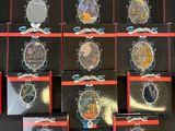 a lot of badges that are on a table