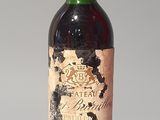 a bottle of wine that is sitting on a table