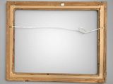 a picture of a wooden frame hanging on the wall