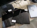 three different types of electronic devices on the table
