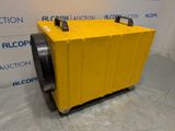 a yellow air conditioner sitting on top of a pallet